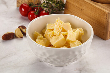 Crushed parmesan cheese in the bowl