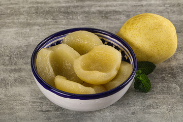 Canned yellow pear with syrup