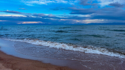 Big waves. stormy sea, thunderclouds. Kyrgyzstan, Lake Issyk-Kul