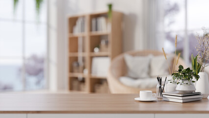 A wooden tabletop adorned set against a blurred background of a cozy Scandinavian living room.