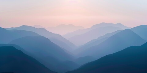 The mountains are covered in a blue mist, creating a serene and peaceful atmosphere. The sky is a soft pink color, adding to the calming effect of the scene. The mountains are a beautiful