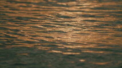Waves On Lake During Sunny Spring Day. Glare On Sea Water Or Ocean. Background With Reflection.
