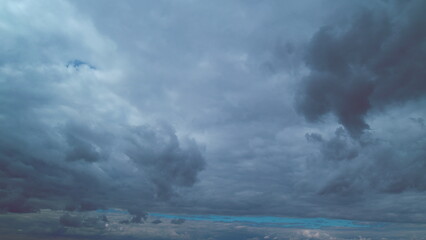 Stormy Cumulus Clouds Move On Horizon Of A Dramatic Sky. Weather Forecast. Cyclone Or Meteorology.