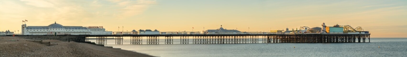 Panoramic view of the Brighton Pier at sunrise. England