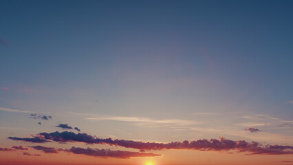 High cloud, twilight time. Different shades clouds across darkening blue horizon.