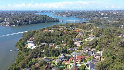 Aerial drone view above Illawong in the Sutherland Shire, South Sydney, NSW Australia on a sunny...