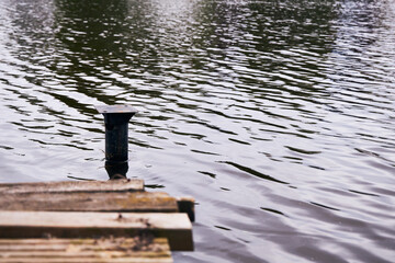 pier outside the city on the river and a marina stop 