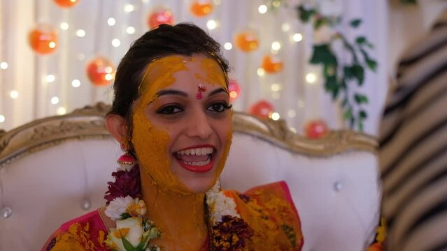 Applying a Red Dot to the Indian Bride During the Pithi Ceremony - Close Up