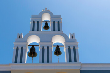 Santorini, Greece, May 3, 2024. The three bells of the Church of the Ascension of the Blessed...
