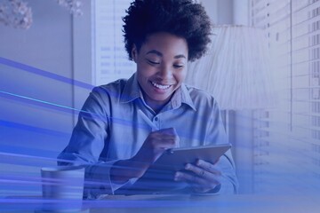 Woman working on a digital tablet in the new normal