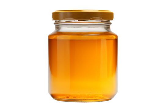 This image shows a jar of honey with a golden lid. The jar is transparent and you can see the honey inside.