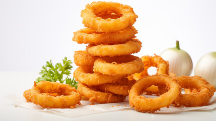 Crunchy onion rings stacked high, focus on texture, against a white background