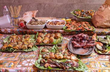 PALERMO, ITALY, JUNE 15, 2023 - Fishes on sale in the Ballarò market of palermo, Sicily, Italy