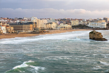 Obraz premium An aerial of Biarritz city at sunset from the ocean. Biarritz, France.