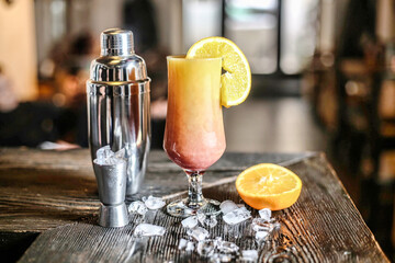 Refreshing Beverage With Shaker on Table