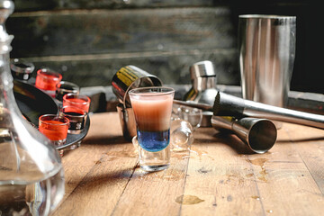 Wooden Table With Liquid-Filled Shot Glass