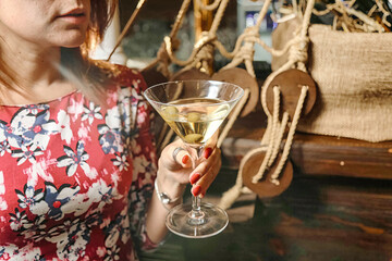 Woman Holding a Martini Glass