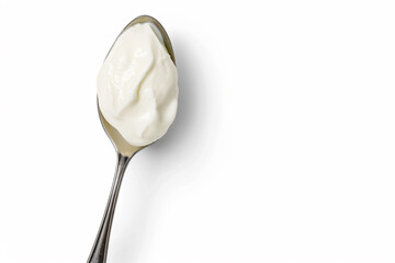 a spoon with a spoonful of yogurt on it