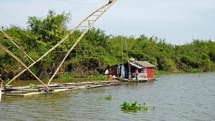 fisherman boat on the tonle sap river in cambodia