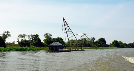 fisherman boat on the tonle sap river in cambodia