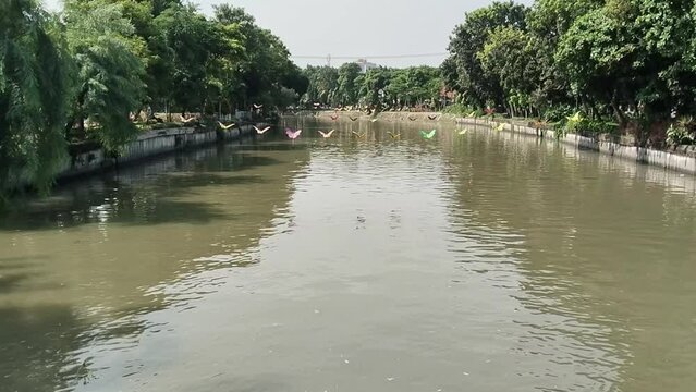 View of the Kalimas River in the Genteng District area of Surabaya, Indonesia. Its upstream starts in Mojokerto City and empties into the Madura Strait.