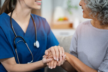 Female doctors shake hands with patients encouraging each other  To offer love, concern, and encouragement while checking the patient's health. concept of medicine