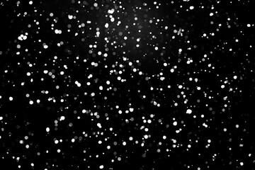 Particles of natural snow. black background