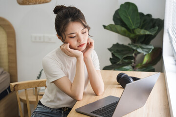 Portrait of asian girl working at home