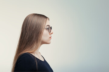 Spectacled profile suggests scholarly thoughts, calm demeanor