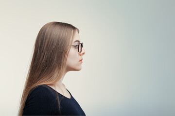 Fototapeta premium Spectacled profile suggests scholarly thoughts, calm demeanor
