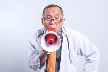Senior Doctor Male Wear Glasses Shouting On Megaphone for Medical Announcement Isolated on White Background 