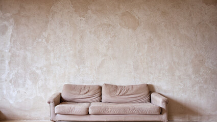 beige sofa, simple beige wall