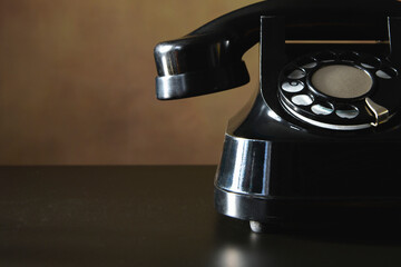 An authentic telephone from the 40s, 50s, and 60s. Close-up. Place for text
