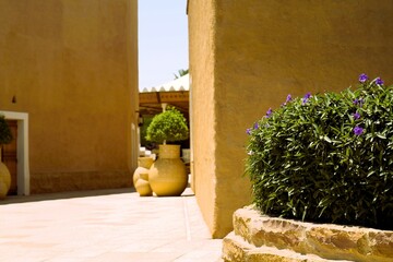 View on clay pots and clay walls of heritage village in Saudi Arabia