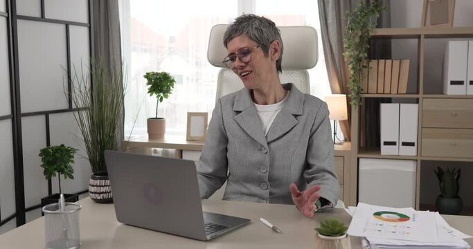 Mature woman share statistics have consultation via video call office