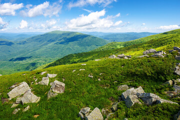 scenery of polonyna smooth. mountainous landscape of ukraine in summer. stones on the grassy hillside in dappled light