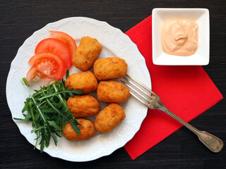 Appetizing Spanish Tapas Croquettes with Jamon and Cheese