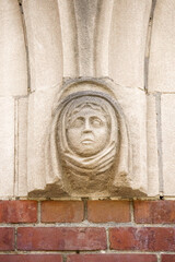 Stone sculpture on the facade of St. Anthony's Catholic Church (1909) in Bloor Street, Toronto, Canada