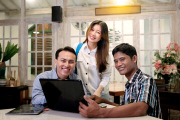 Portrait of multiethnic business colleagues discussing a business project plan during a meeting
