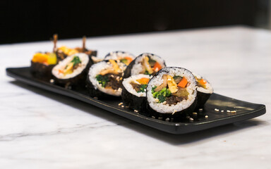 Korean Seaweed Rice Rolls or Kimbap Korean dish made from steamed white rice and various other ingredients