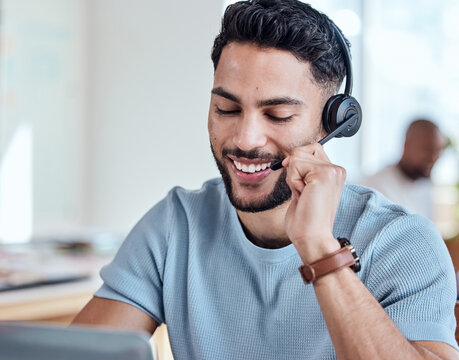 Happy, headset and man in call center for consulting, networking and communication in office. Male telemarketer, smile and customer support in workplace with pride, service and job in online agency