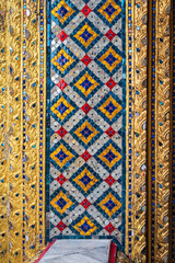 Ornimental designs and patterns at the temple of the Emerald Buddha, Wat Phra Kaew, Bangkok, Thailand