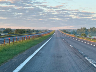 Fototapeta premium Landscape empty highway in the morning, fog on the road
