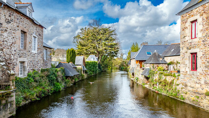 Fototapeta premium Pontrieux, Brittany, France - March 27, 2024: River Trieux running through the medieval village of Pontrieux