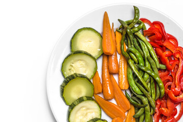 Boiled vegetables. Steamed zucchini, green bean, carrots, pepper. Low calorie diet concept.