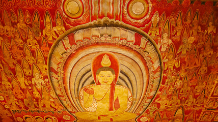 Fototapeta premium Mural painting of Lord Buddha inside Cave 1 Deva Raja Viharaya – The Cave of ‘ Lord of the Gods. , Cave Temple of Dambulla, 1st Century BCE, Sri Lanka. UNESCO world heritage site