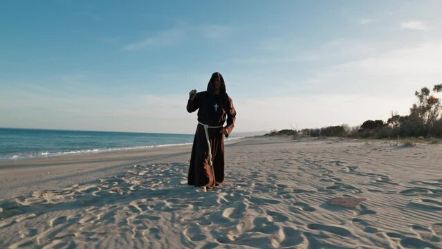 Monk Practising Martial Arts With Nunchaku