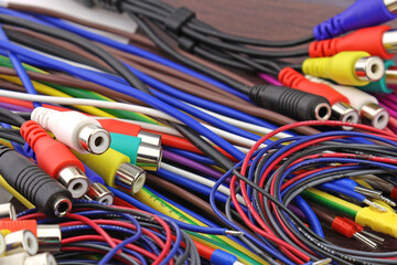 Cable with connectors for connecting audio and video equipment. Close-up.