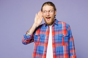 Young curious nosy smiling happy man he wear blue shirt casual clothes try to hear you overhear...