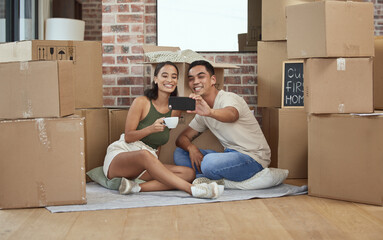 Couple, selfie and boxes in new house and happy, profile picture and real estate for mortgage and...